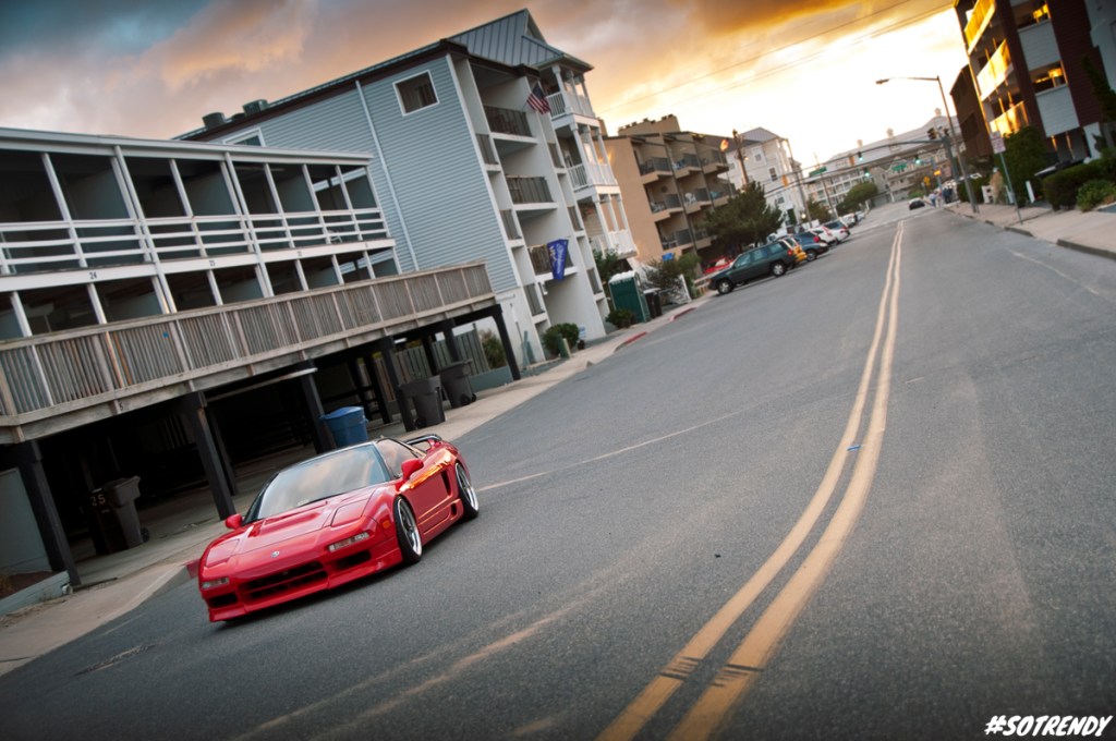 The lady in red gleams beautifully while the sunsets over the horizon